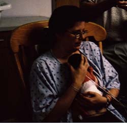 Holding my son skin to skin for the first time 24 hours after birth.